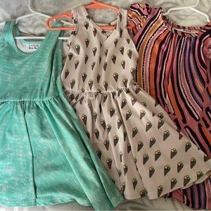 Three size 2T DotDotSmile dresses.